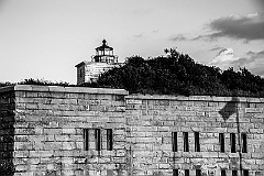 Clarks Point Light on Stone Wall of Fort Taber -BW
